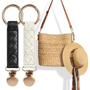 image:imageNiveaya Hat Clip for Travel 2Pcs Sleek Woven Design with Durable Metal Clip Secure Hat Holder for Straw Sun Hats amp Baseball Cap on Bag Purse Backpack Luggage Chic Beach Cruise Travel Essentials2pcs Blackcream White